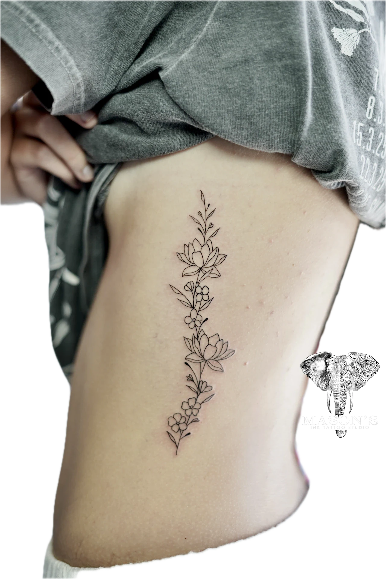 Long Flower and Leaf tattoo by Mason's Ink Tattoo Studio, Bali