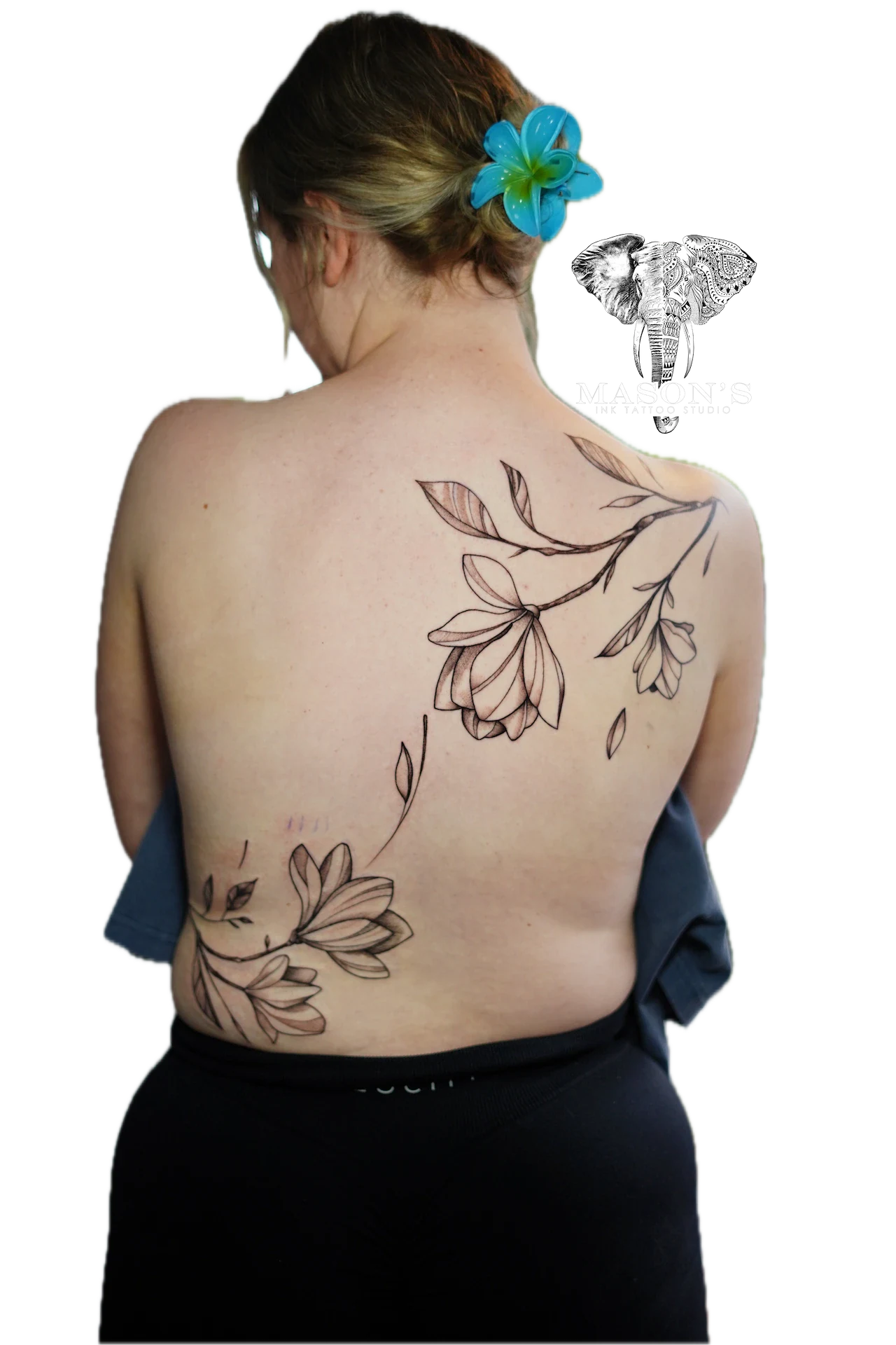 Floral Tattoo Style Design: Large minimalist floral design on the back