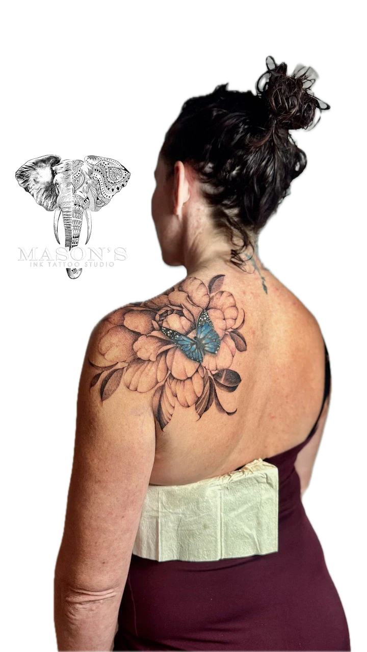 Realism Flower and Butterfly Back Tattoo Design - Floral tattoo by Mason's Ink Tattoo Studio, Bali