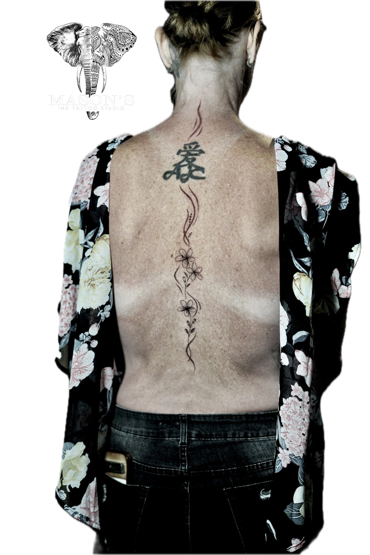 Flower on back tattoo by Mason's Ink Tattoo Studio, Bali