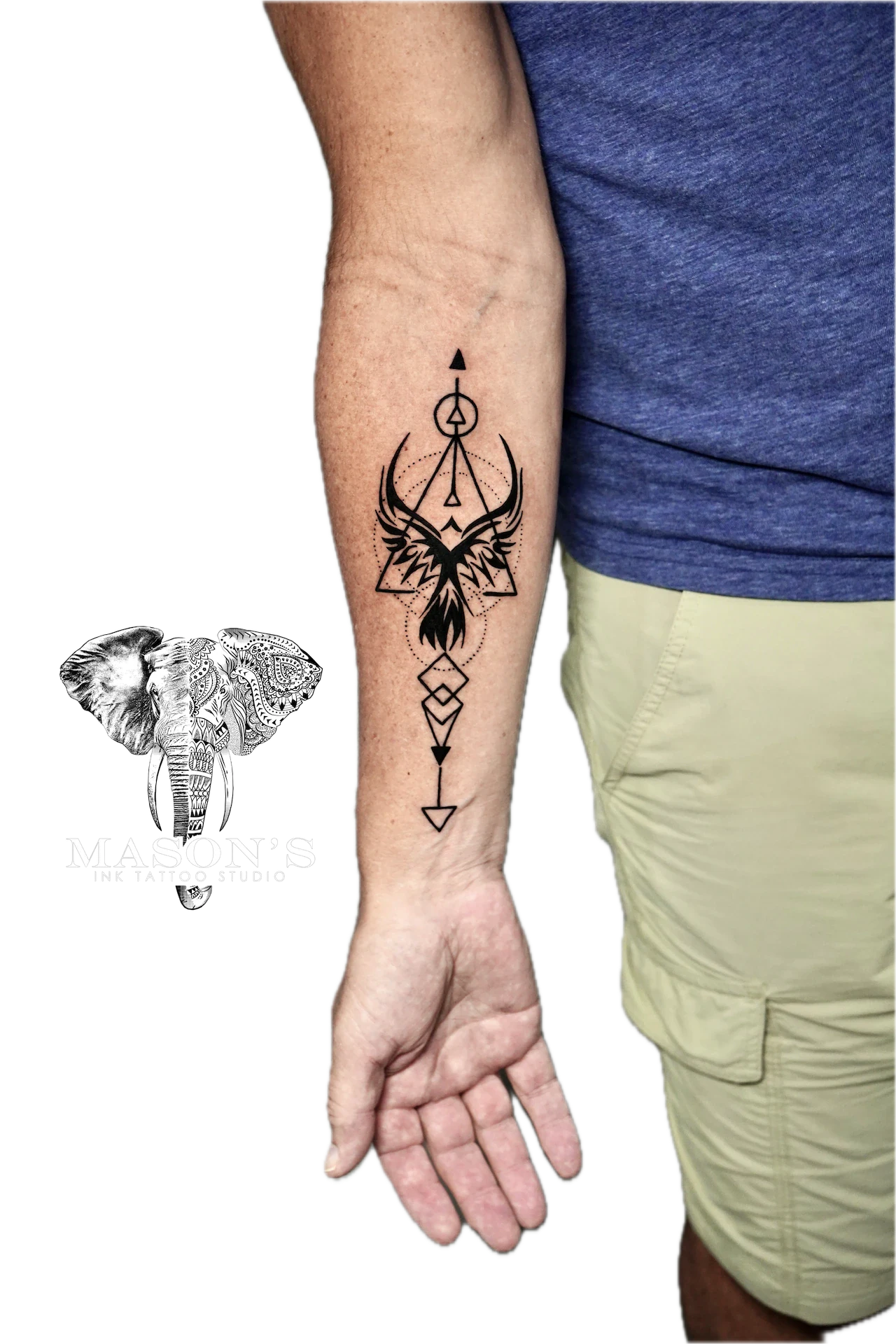 Geometric Tattoo Style Design: a geometric pattern with feathers and triangles on the forearm
