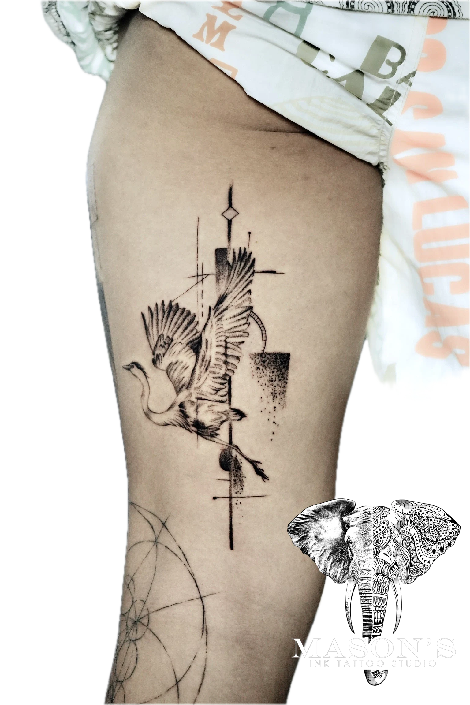 Geometric Conceptual Tattoo Style Icarus Design: a dove and cross with geometric patterns on a thigh