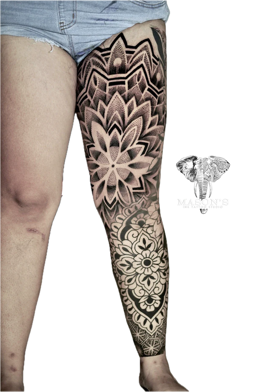 Mandala Tattoo Design: a detailed mandala and floral geometric pattern on the leg