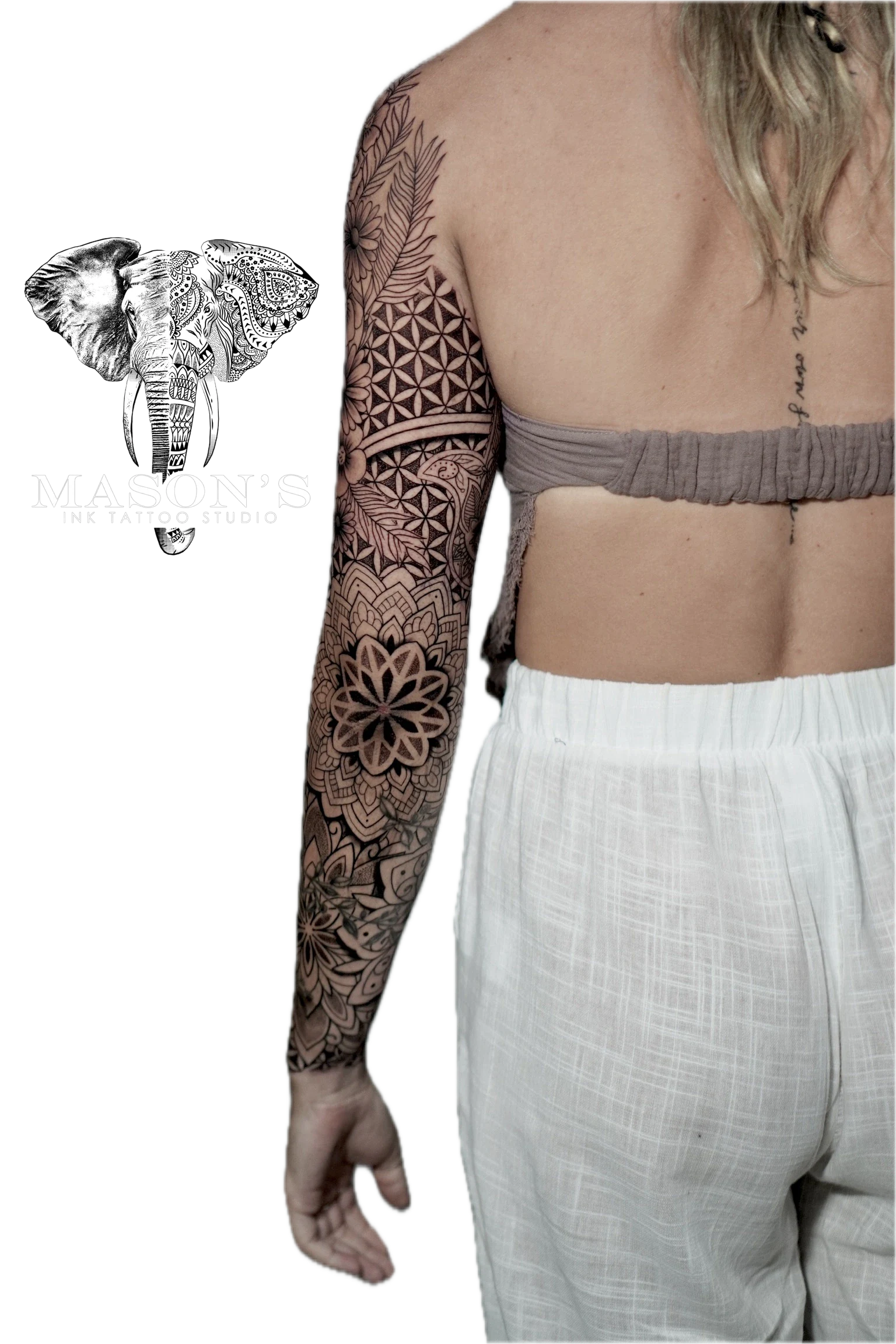Mandala Tattoo Style Design: Intricate geometric and floral patterns covering the full arm