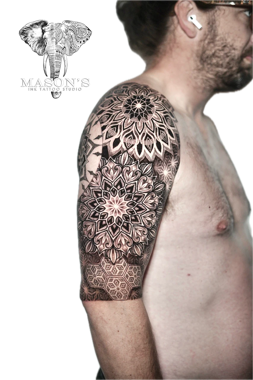 Mandala Tattoo Design: Intricate mandala and geometric pattern sleeve tattoo