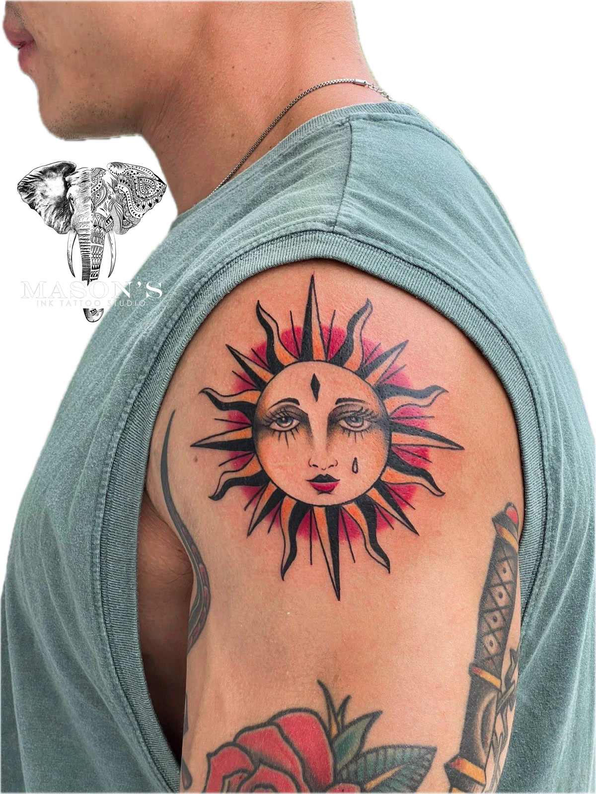 Colored Traditional Tattoo Design: a sun face with tears and rays on the upper arm