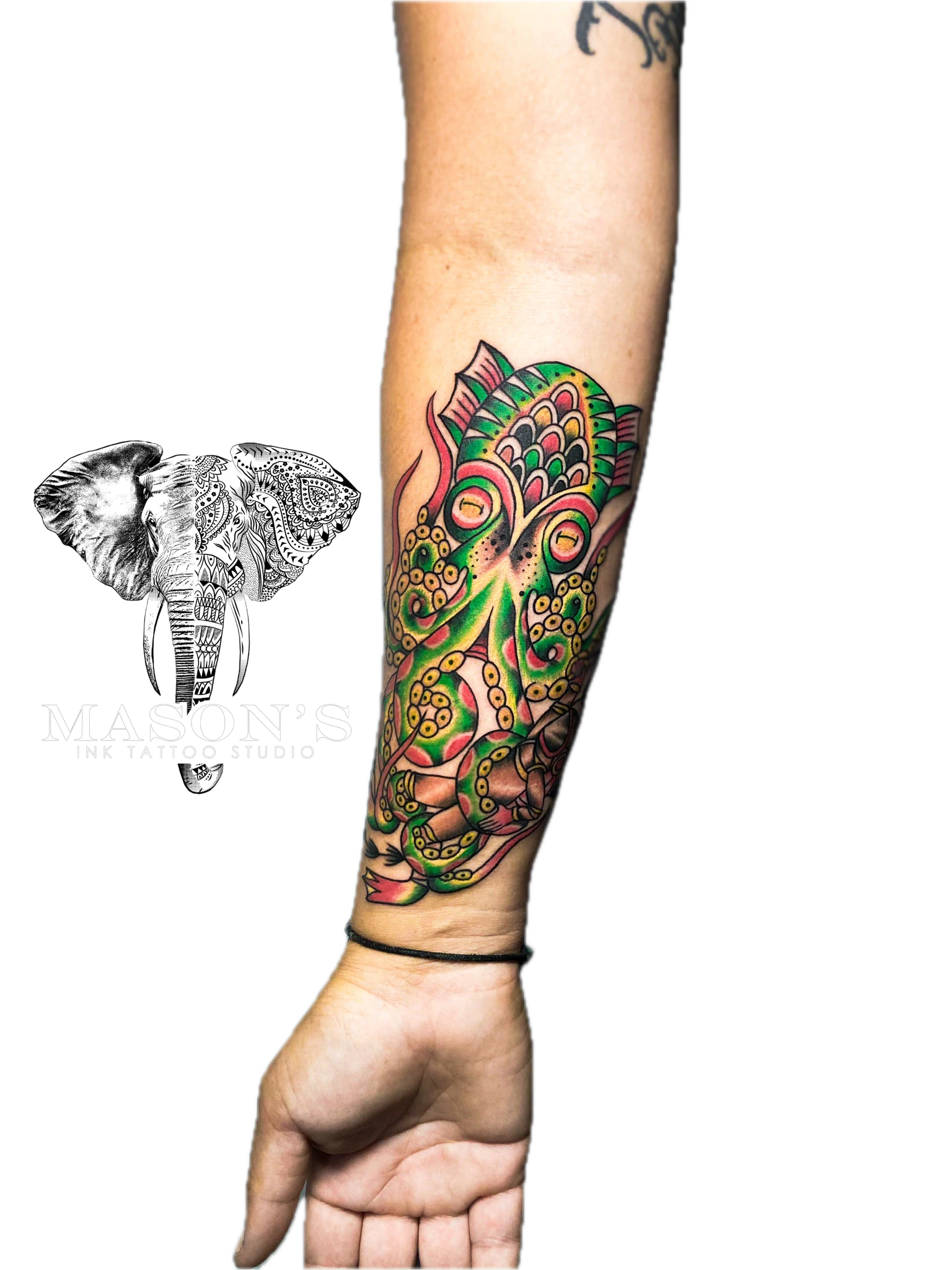 Neo-Traditional Elephant Mandala Tattoo Design: a colorful elephant mandala with floral patterns on the forearm