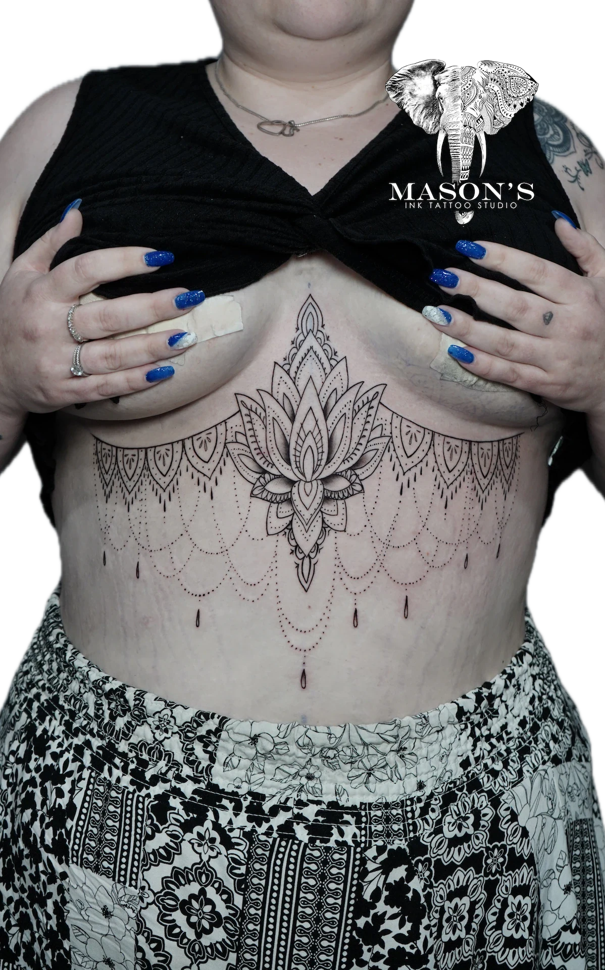 Ornamental Tattoo Design: a large lotus mandala with geometric patterns and teardrops on the stomach