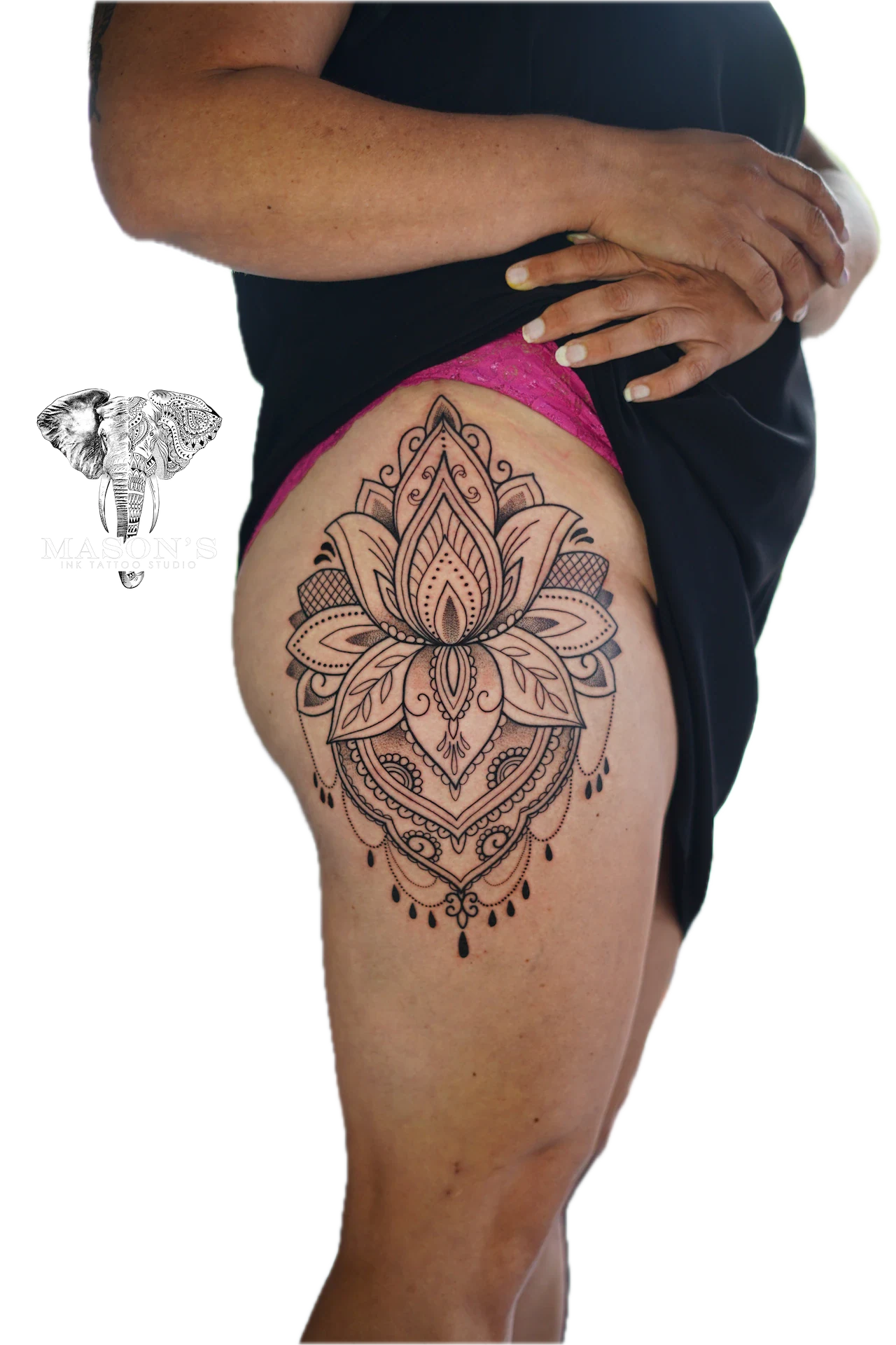 Ornamental Tattoo Design: a large black and grey lotus mandala on the thigh