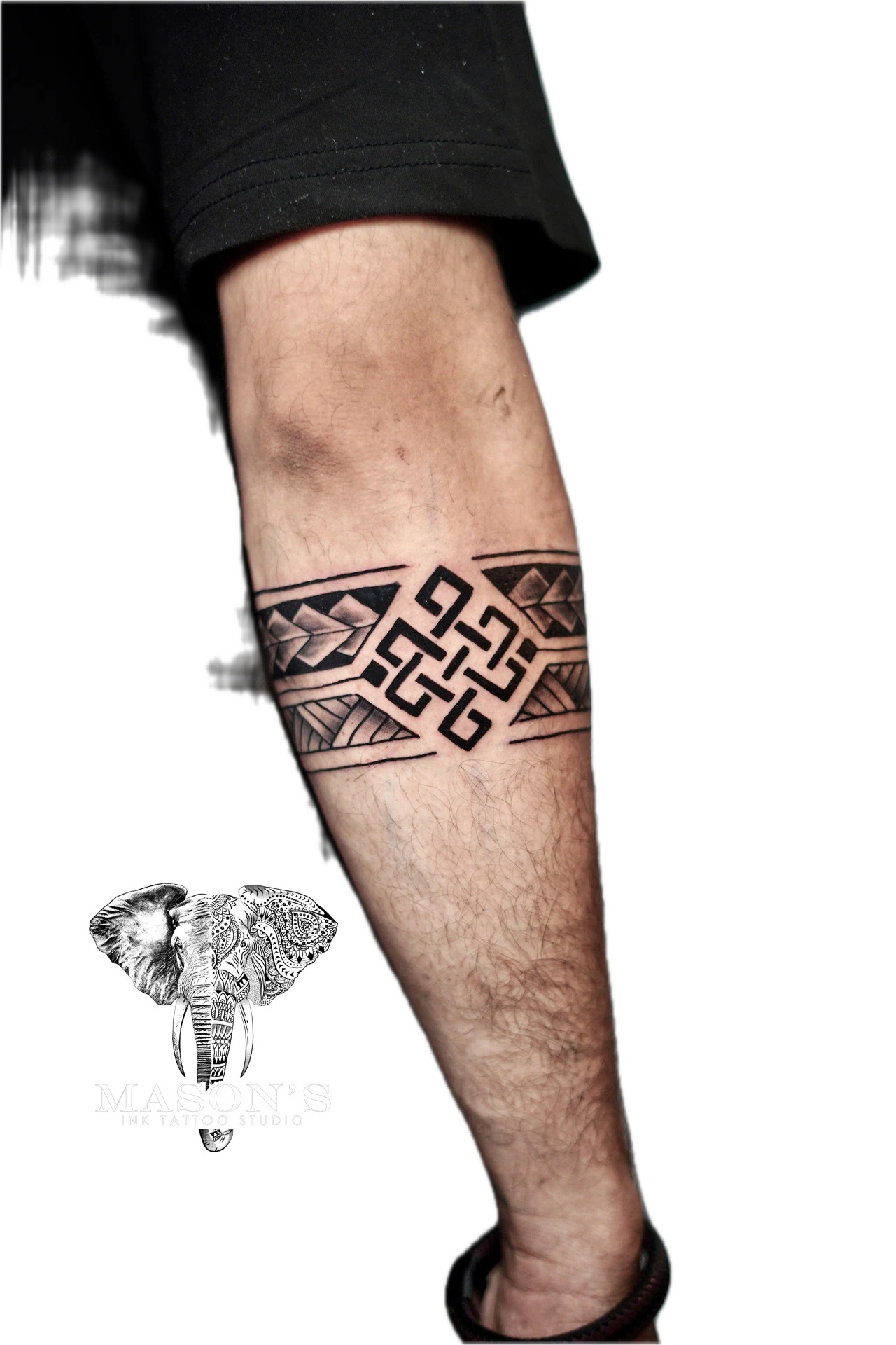 Polynesian Tattoo Design: a detailed geometric pattern tattoo on the calf