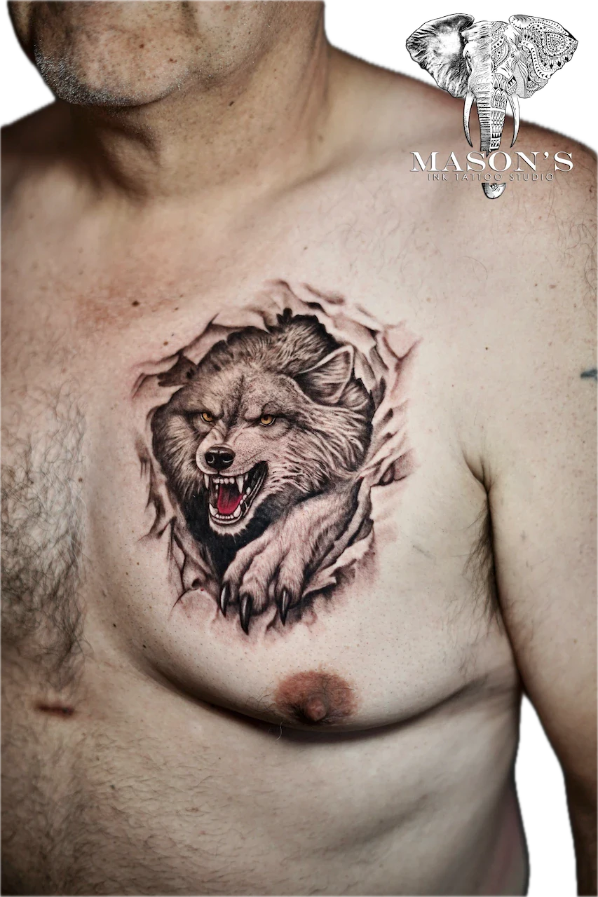 Realism Wolf Tattoo Design: a wolf bursting through torn skin on the chest