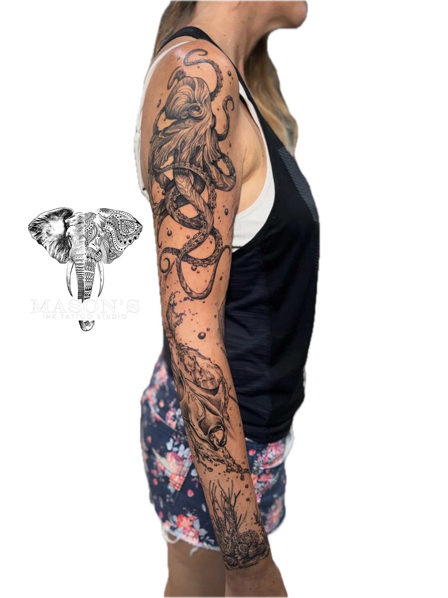 Black and Grey Realism Octopus Tattoo Design: a large black and grey ocean-themed sleeve tattoo with a snake and fish