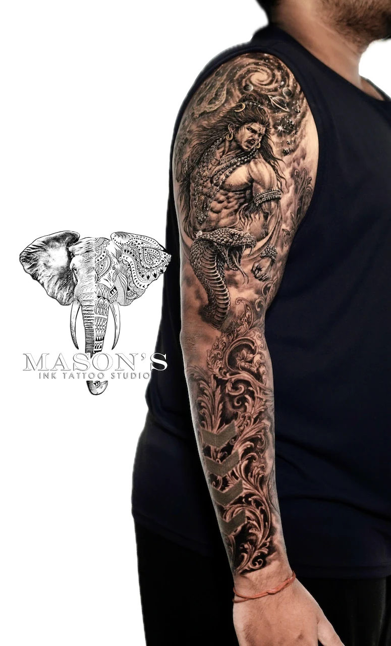 Realism Indian Angel Tattoo Design: a full sleeve tattoo of a man fighting a snake with ornate patterns