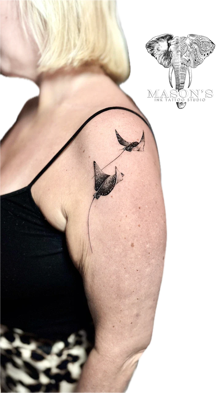 Realism Manta Ray Tattoo Design: Three manta rays connected by a string with moons above