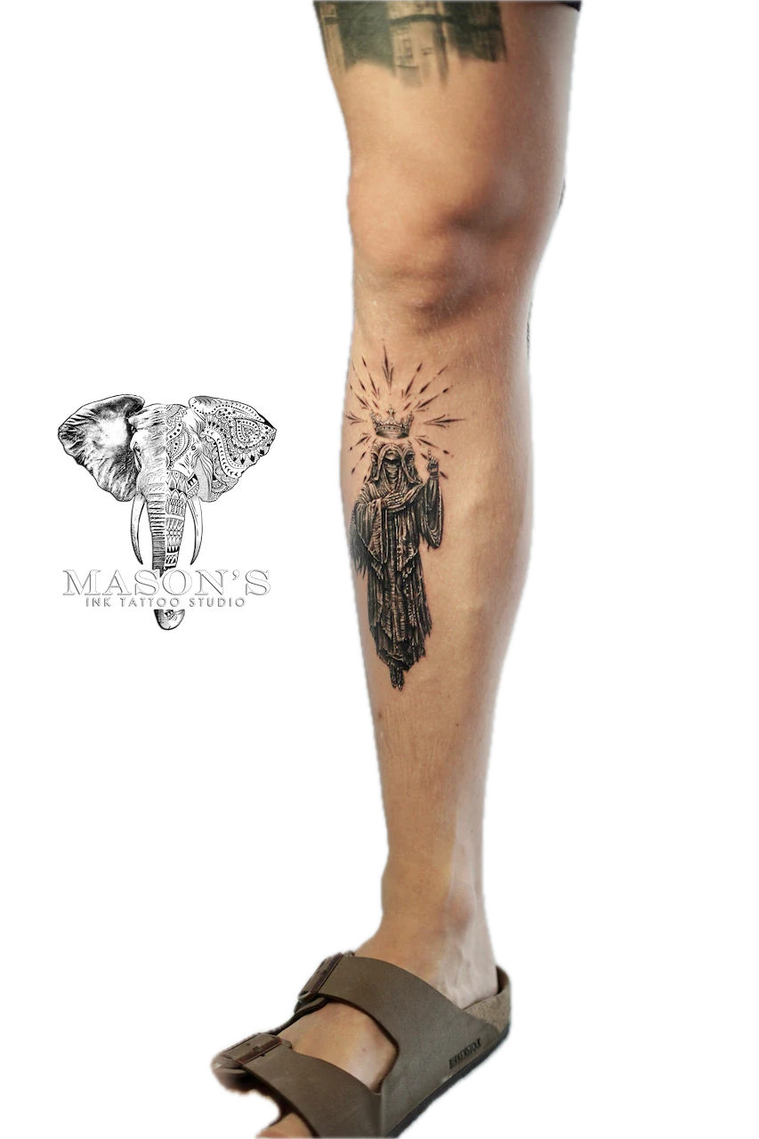 Realism Tattoo Design: a black and grey angel with a halo on a calf