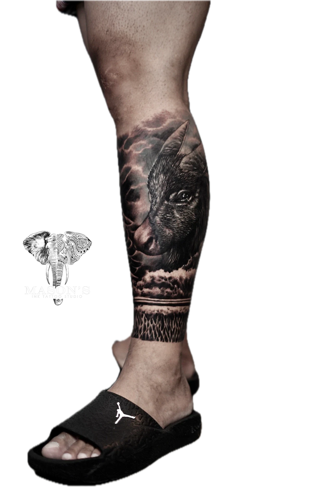 Realism Buffalo Tattoo Design: a large wolf portrait with clouds and feathers on a calf