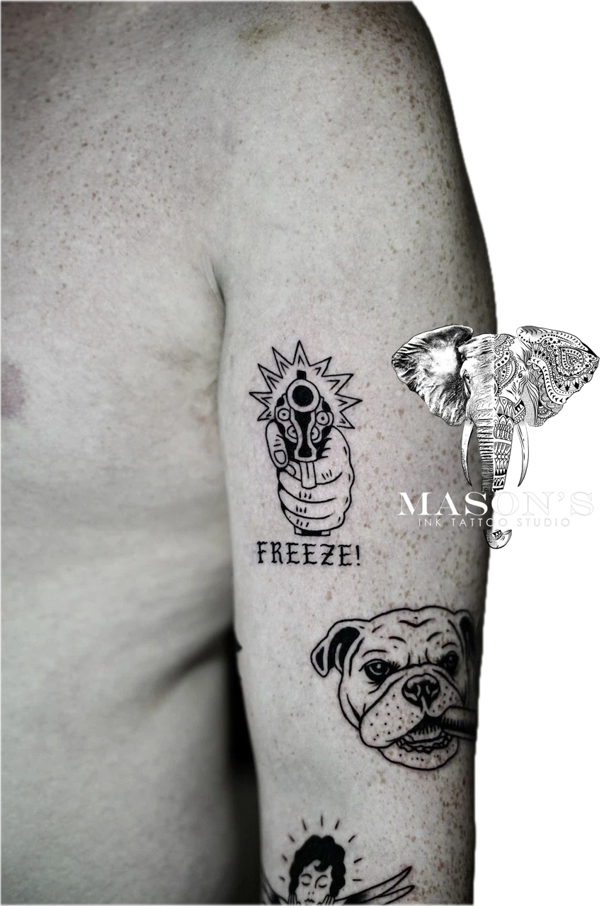 Traditional Gun and Script Tattoo Design by Mason's Ink Tattoo Studio, Bali