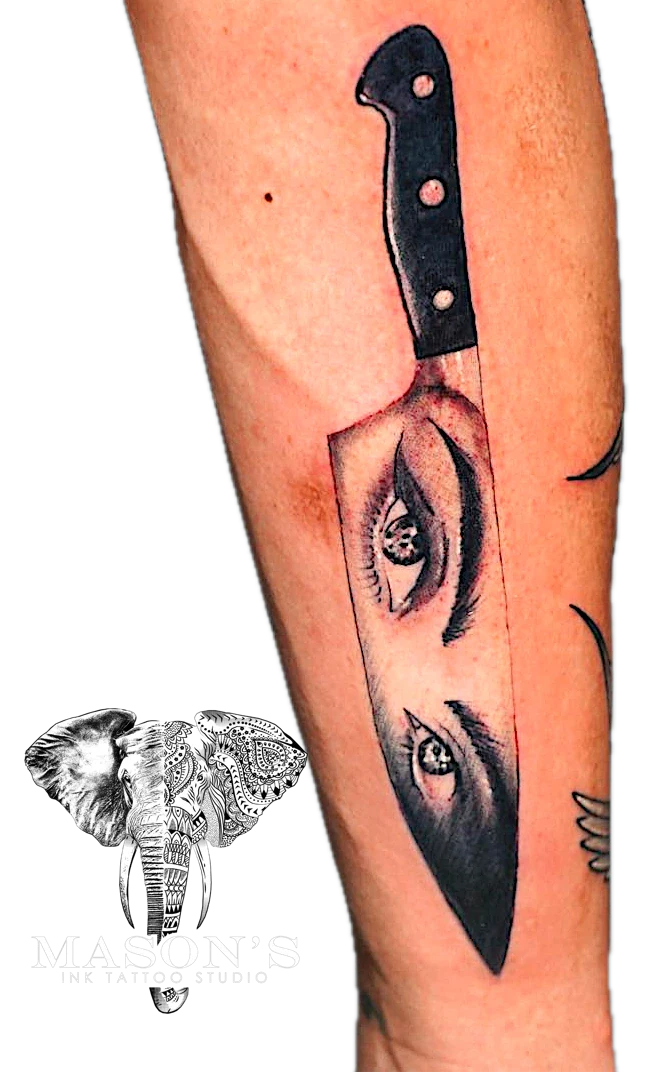 Traditional Knife with woman eyes tattoo by Mason's Ink Tattoo Studio, Bali