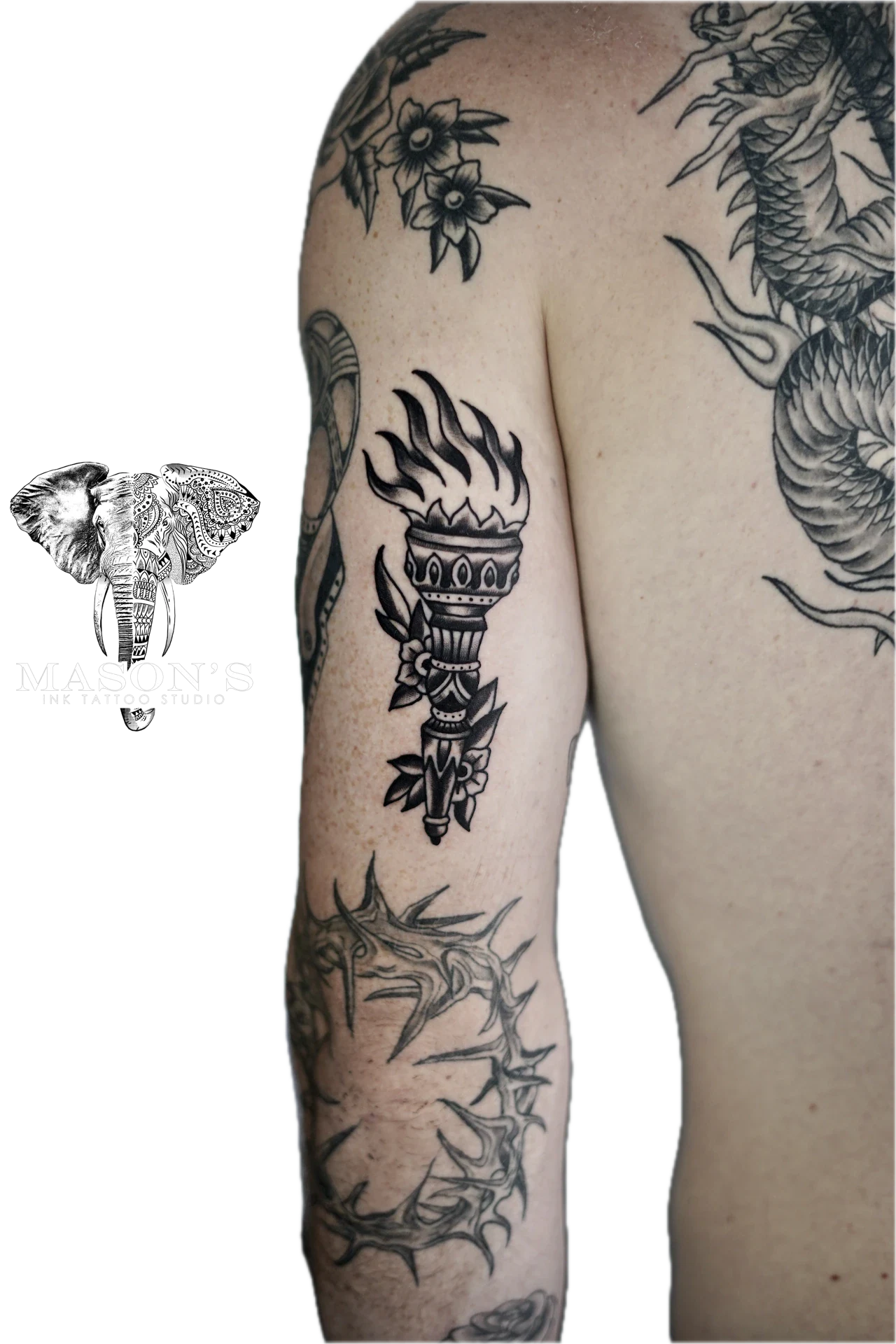 Traditional Fire Flower tattoo by Mason's Ink Tattoo Studio, Bali
