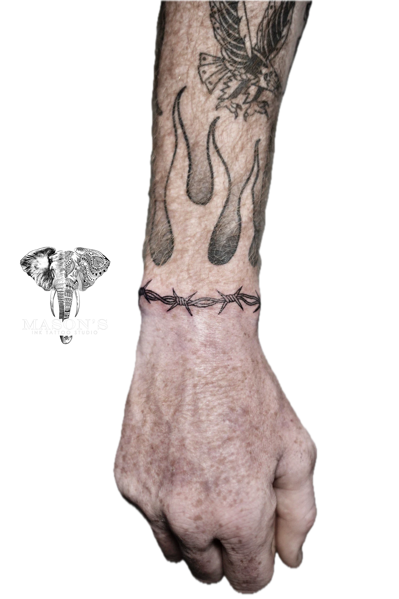 Traditional Barbed Wire Tattoo by Mason's Ink Tattoo Studio, Bali