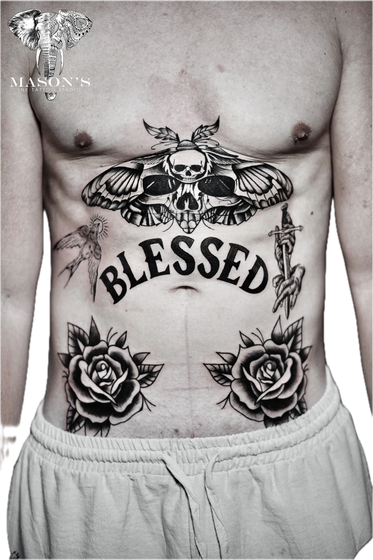 Traditional Butterly Skull and Roses Tattoo by Mason's Ink Tattoo Studio, Bali