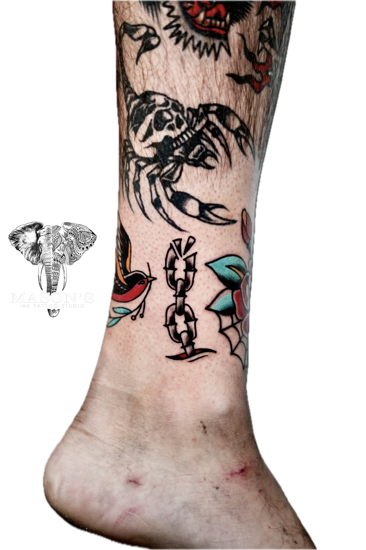 Traditional Chain Bird and Flower Tattoo by Mason's Ink Tattoo Studio, Bali