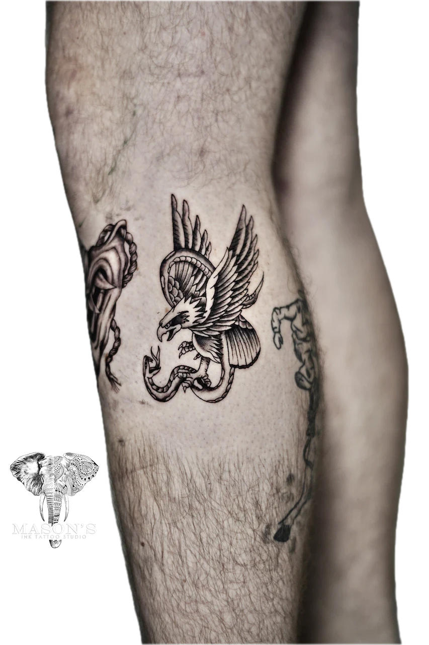 Traditional Eagle and Snake Tattoo by Mason’s Ink - Traditional tattoo by Mason's Ink Tattoo Studio, Bali