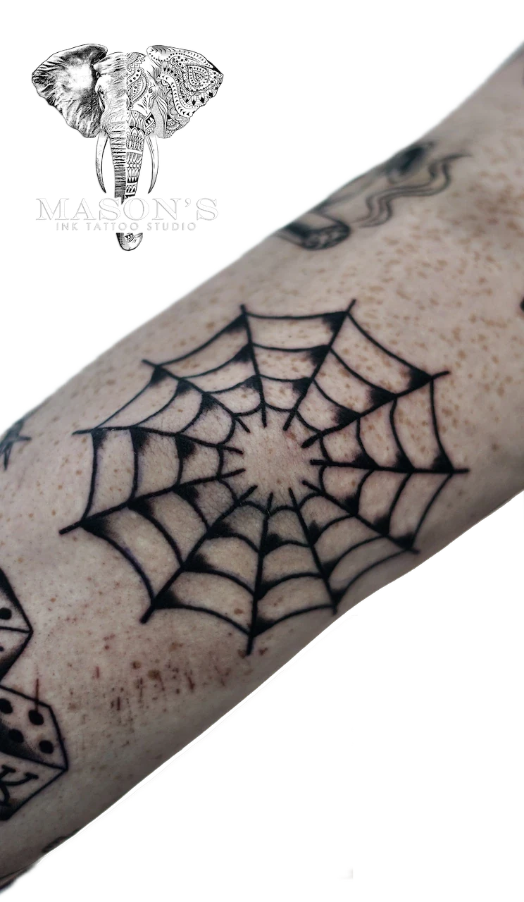 Traditional Spider Web Tattoo Design by Mason's Ink Tattoo Studio, Bali