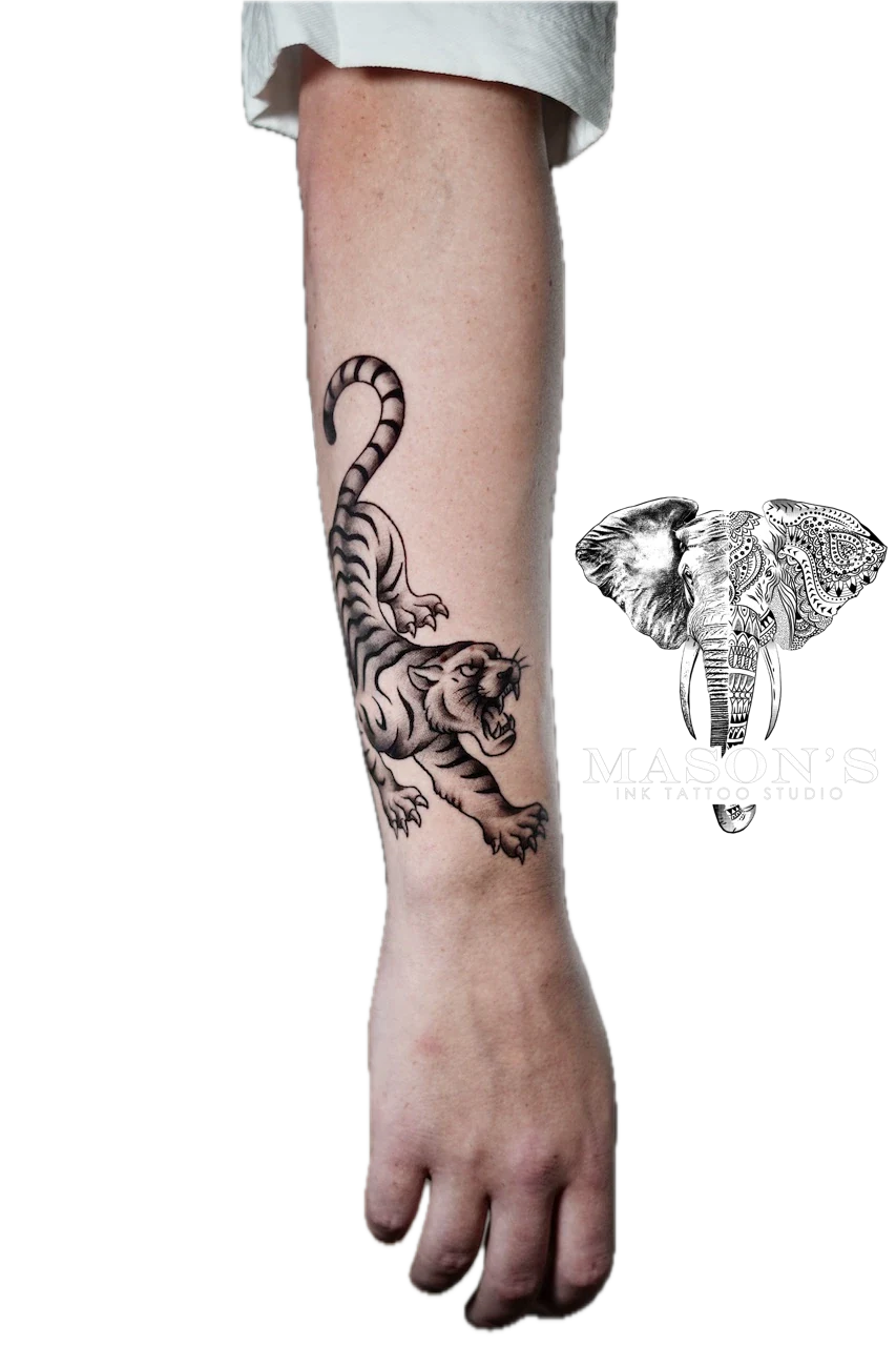 Traditional Tiger Tattoo Design: a large black and grey tiger and snake tattoo on a forearm
