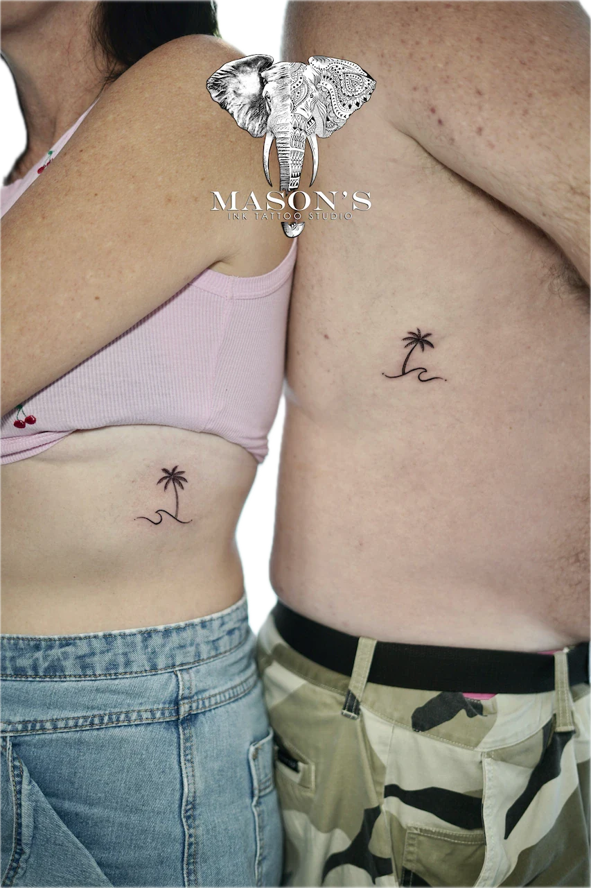 Fine Line Palm Tree and Waves Couple Tattoo Design - custom tattoo by Mason's Ink Tattoo Studio, Bali